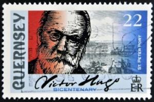 21838587-guernsey--circa-2002-un-timbre-imprim--guernesey-montre-victor-hugo-et-st-peter-port-vers-2002